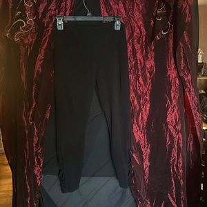 Cute black leggings with cross stitch at both ankles!